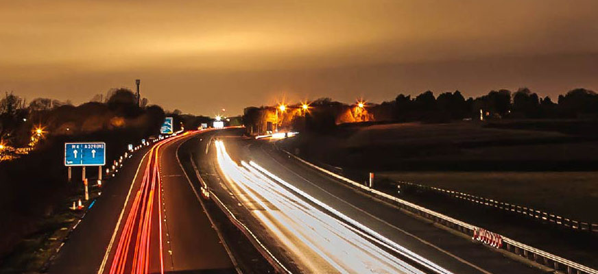 motorway at night with light trails